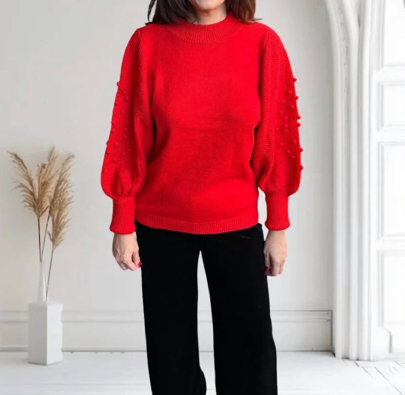 Designer Knit TopsPom Pom Balloon Sleeve Sweater In Red